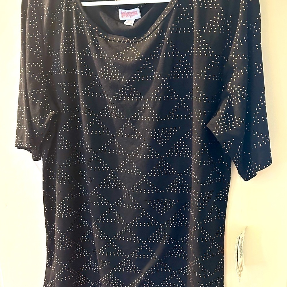 Women's black top with gold top details, size X3.